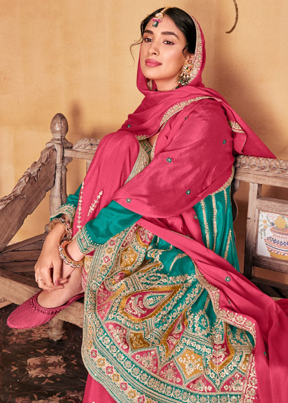 Buy Now Amazing Turquoise Heavy Chinnon Embroidered Palazzo Style Suit Online in USA, UK, Canada, Germany, Australia & Worldwide at Empress Clothing.