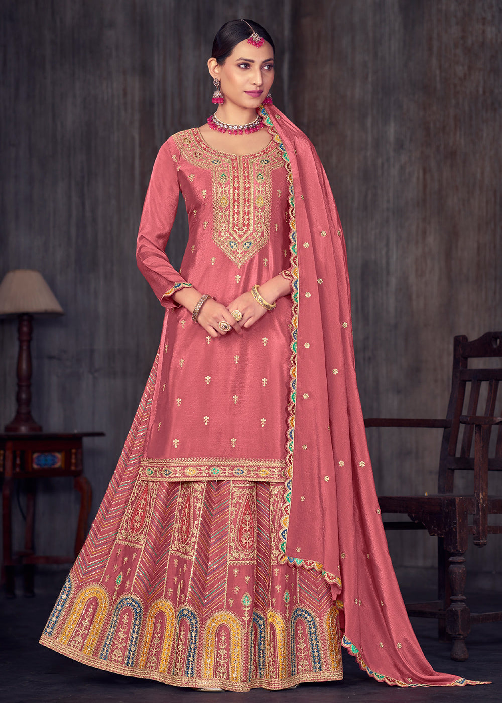 Buy Now Puce Pink Heavy Chinnon Embroidered Lehenga Kurti Suit Online in USA, UK, Canada, Germany, Australia & Worldwide at Empress Clothing. 