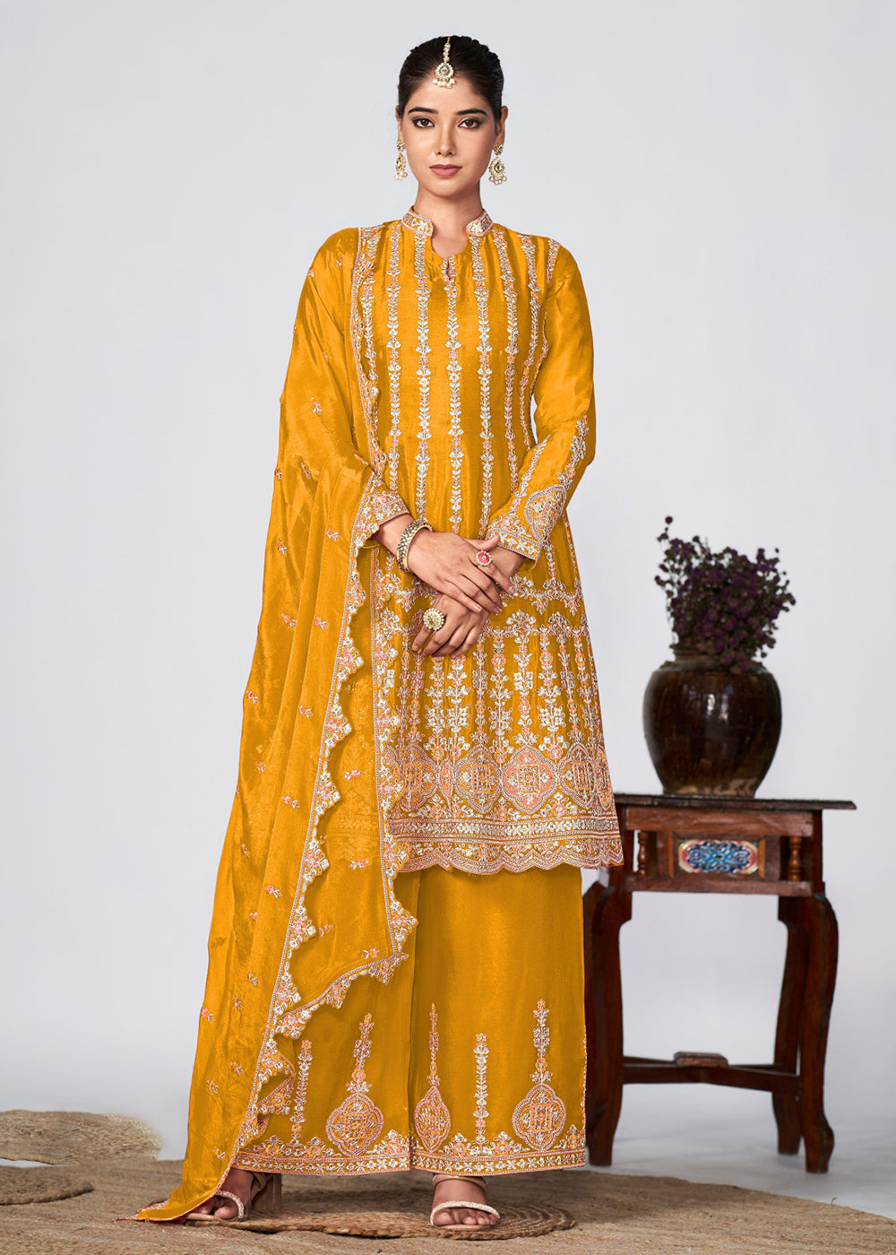 Buy Now Mustard Heavy Chinnon Embroidered Festive Palazzo Suit Online in USA, UK, Canada, Germany, Australia & Worldwide at Empress Clothing. 