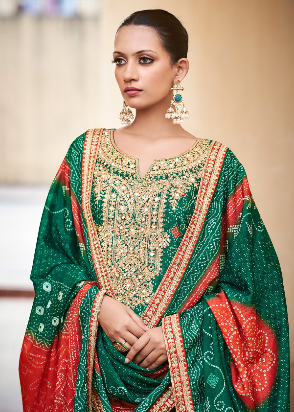 Buy Now Green Chinnon Mirror Embroidered Palazzo Style Suit Online in USA, UK, Canada, Germany & Worldwide at Empress Clothing.