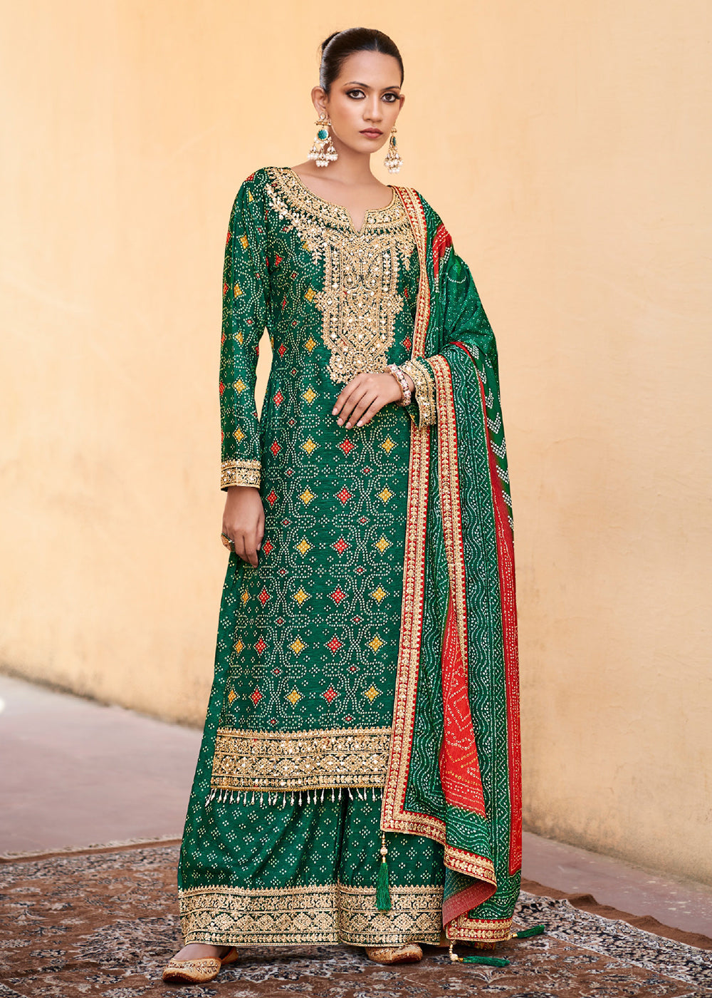 Buy Now Green Chinnon Mirror Embroidered Palazzo Style Suit Online in USA, UK, Canada, Germany & Worldwide at Empress Clothing.