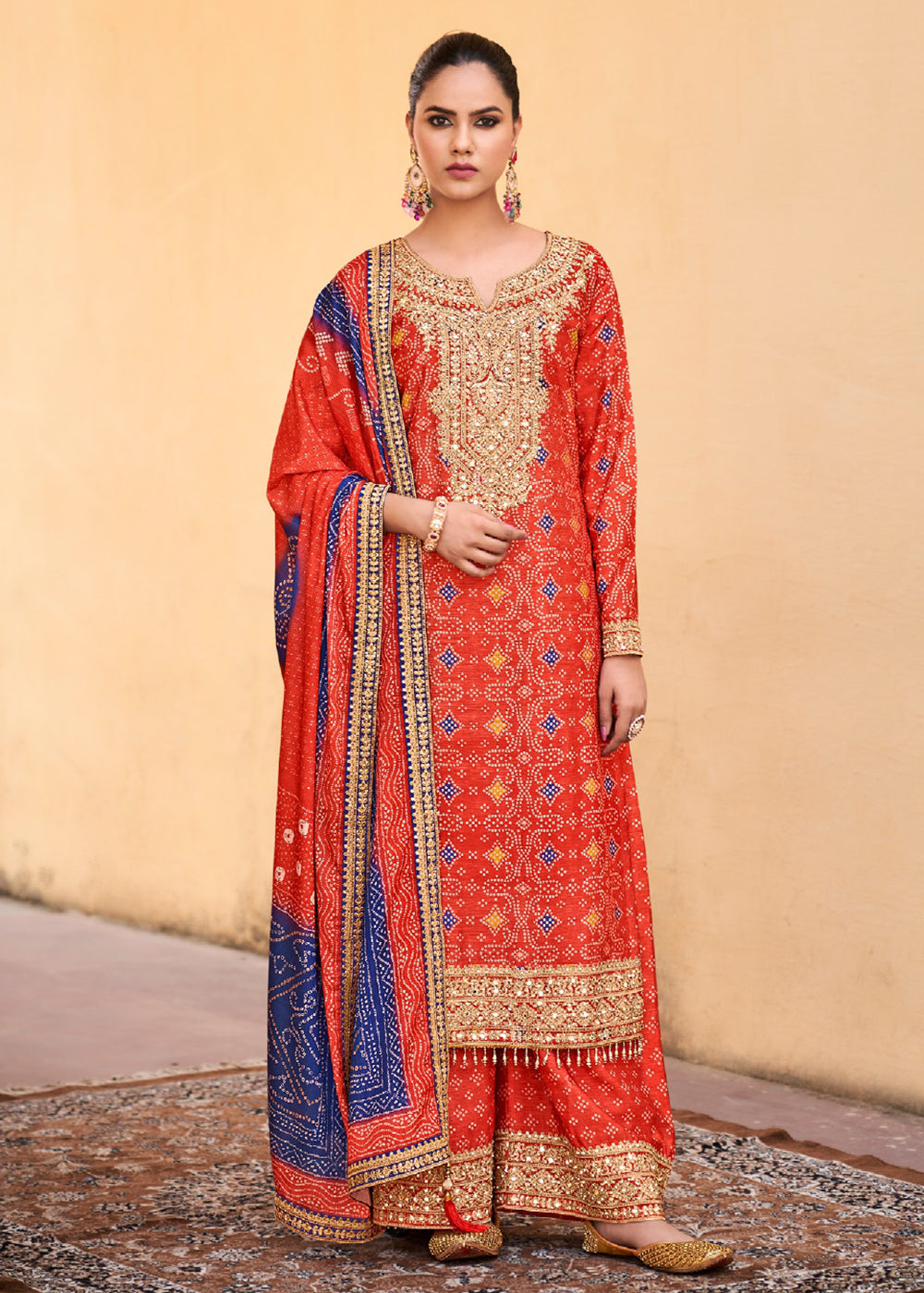 Buy Now Rust Chinnon Mirror Embroidered Palazzo Style Suit Online in USA, UK, Canada, Germany & Worldwide at Empress Clothing.