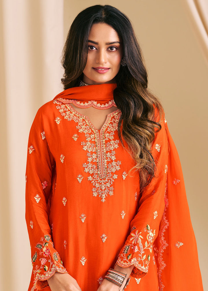 Buy Now Festive Orange Embroidered Flared Palazzo Suit Online in Newark, Yorktown, Toronto, London, Orlando, Munich, Chicago, New York & Worldwide at Empress.
