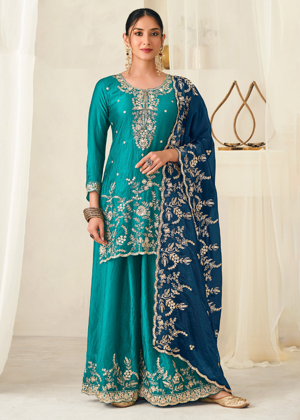 Buy Now Teal Fendy Silk Zarkan Work Festive Palazzo Suit Online in New York, Los Angeles, San Jose, Chicago, Houston, Fremont, Dubai & Worldwide at Empress.