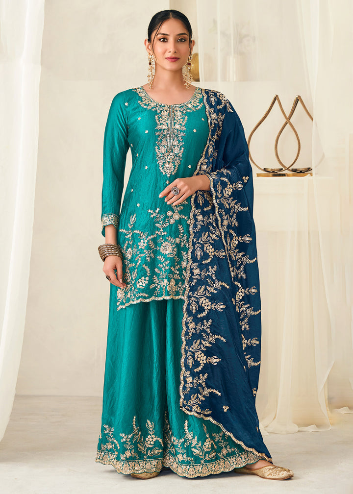 Buy Now Teal Fendy Silk Zarkan Work Festive Palazzo Suit Online in New York, Los Angeles, San Jose, Chicago, Houston, Fremont, Dubai & Worldwide at Empress.