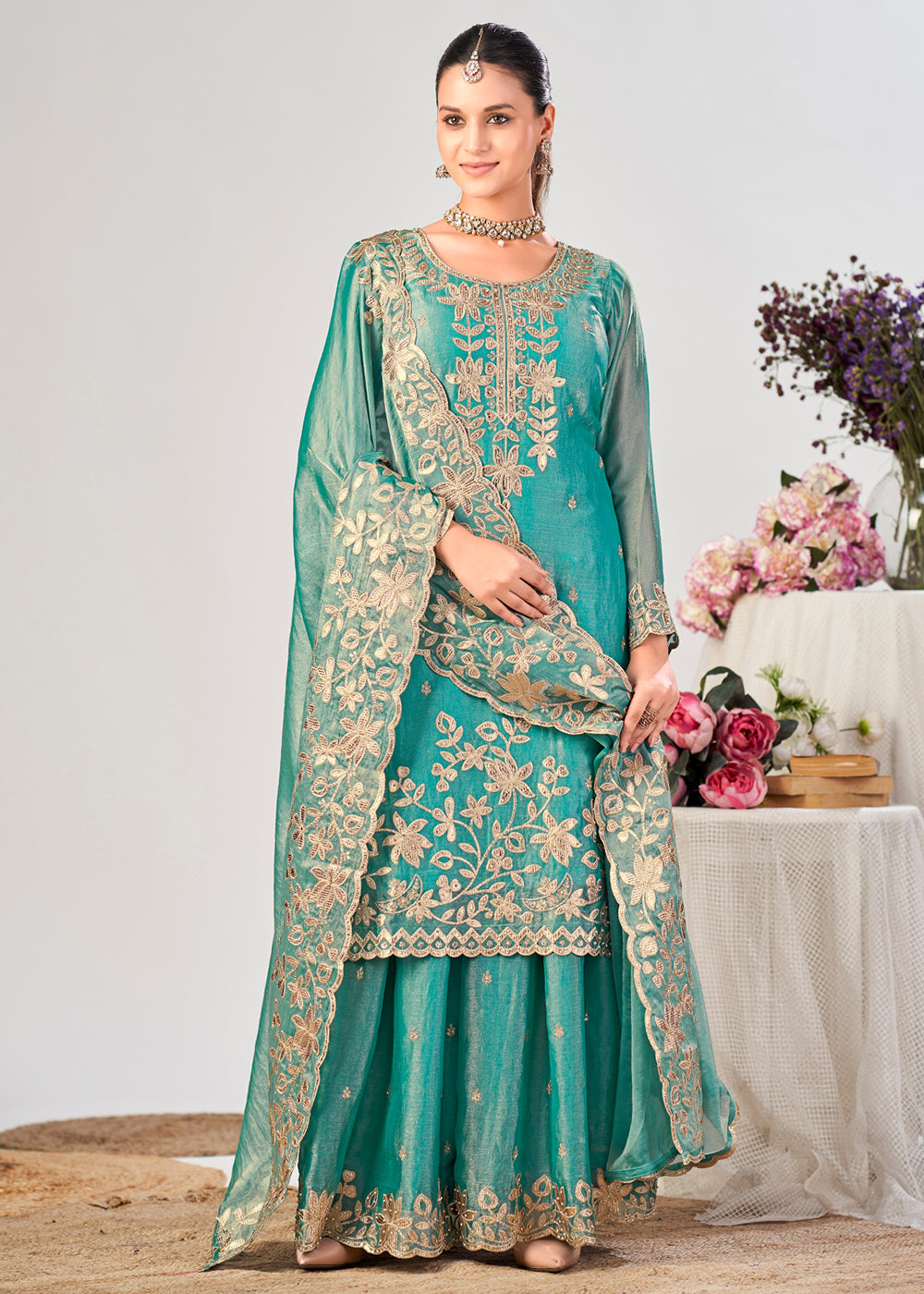 Buy Now Turquoise Premium Fendy Silk Festive Palazzo Suit Online in US, UK, Canada, Netherlands, Germany, Italy, France, Greece, Austria &amp; Worldwide at Empress.