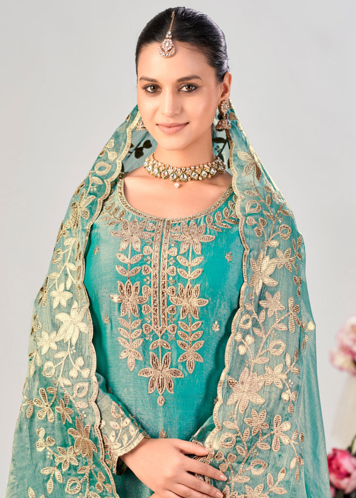 Buy Now Turquoise Premium Fendy Silk Festive Palazzo Suit Online in US, UK, Canada, Netherlands, Germany, Italy, France, Greece, Austria &amp; Worldwide at Empress.