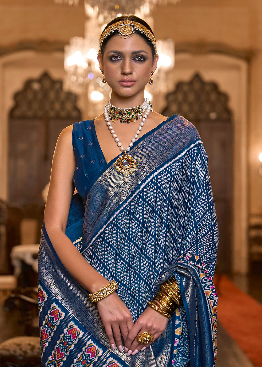 Shop Now Pretty Navy Blue Woven Zari & Printed Patola Silk Traditional Saree from Empress Clothing in USA, UK, Canada & Worldwide.