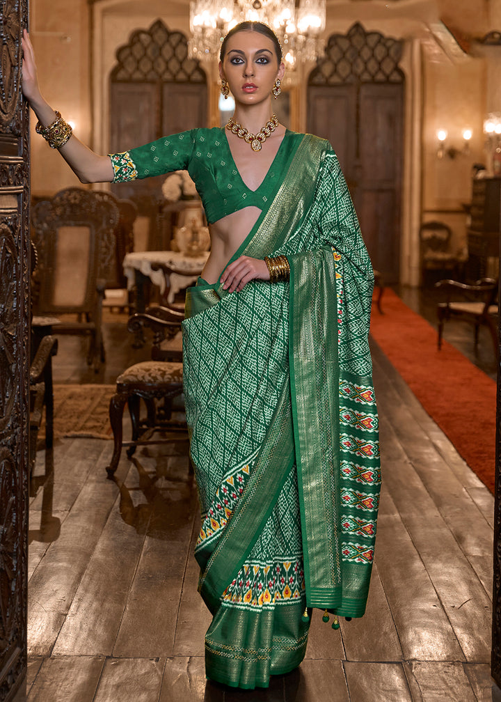 Shop Now Marvelous Green Woven Zari & Printed Patola Silk Traditional Saree from Empress Clothing in USA, UK, Canada & Worldwide.