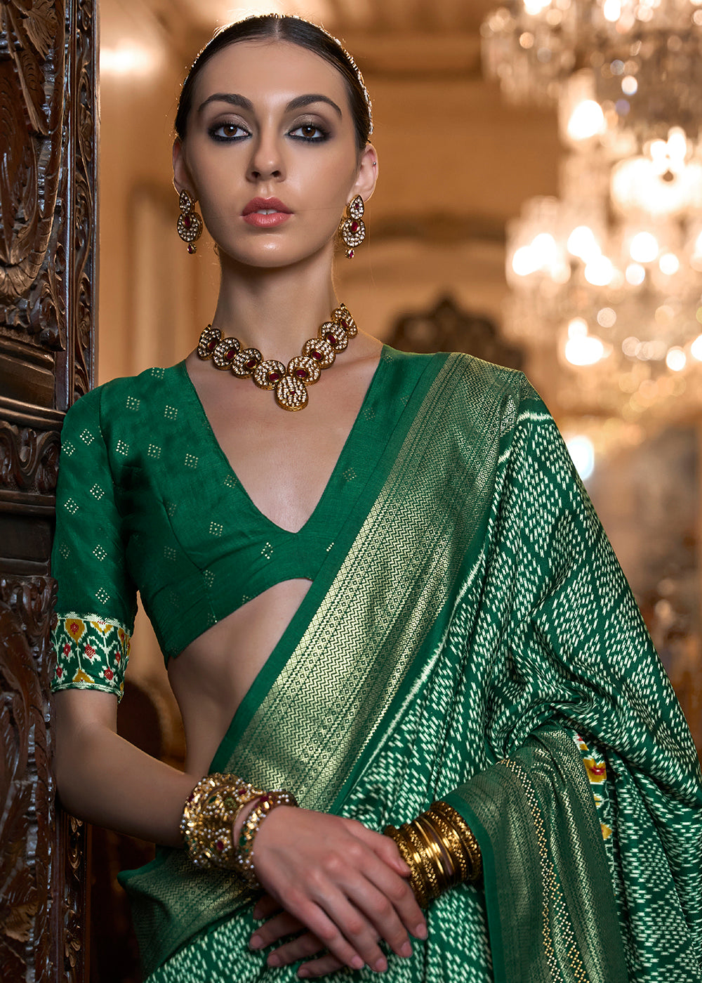 Shop Now Marvelous Green Woven Zari & Printed Patola Silk Traditional Saree from Empress Clothing in USA, UK, Canada & Worldwide.