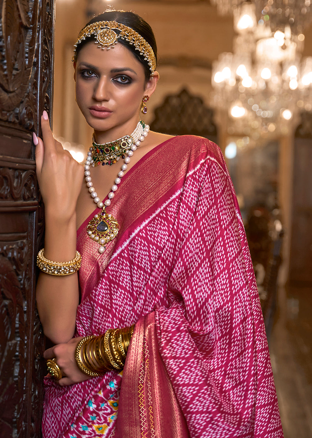 Shop Now Astounding Pink Woven Zari & Printed Patola Silk Traditional Saree from Empress Clothing in USA, UK, Canada & Worldwide. 