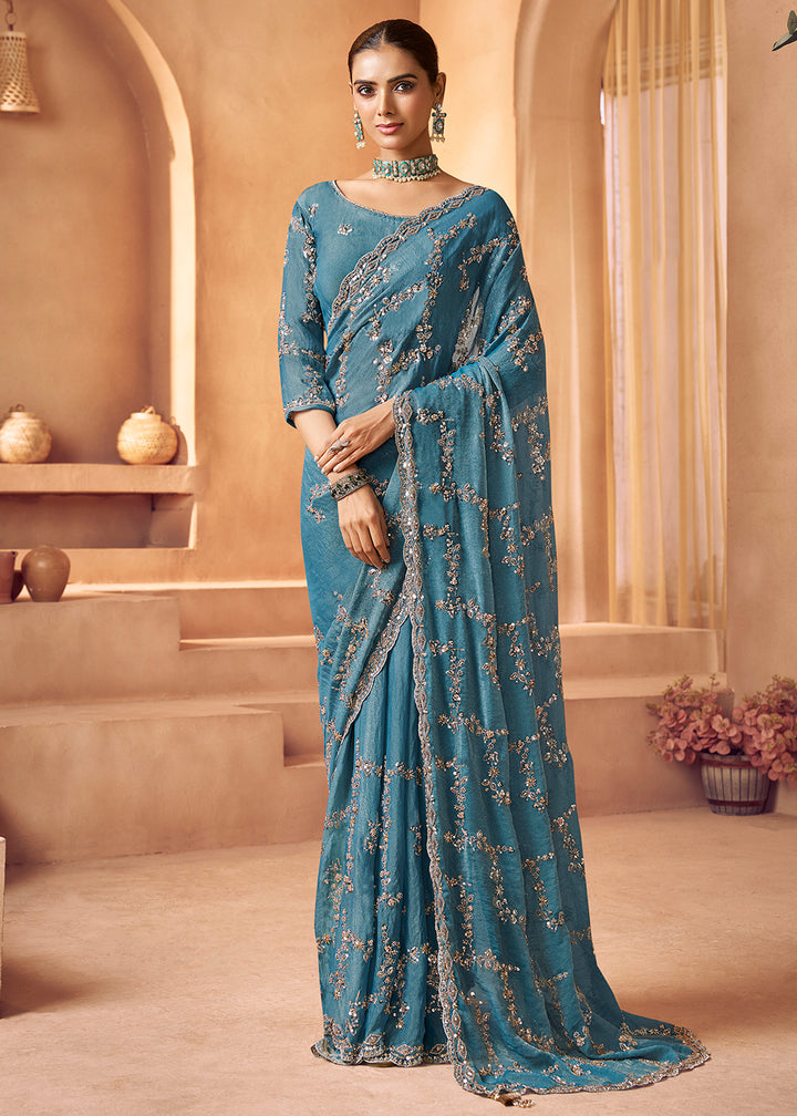 Buy Livid Blue Tissue Silk Heavy Embroidered Designer Saree Online in USA, UK, Canada, France, Germany, Italy, Denmark, UAE, Singapore & Worldwide at Empress.
