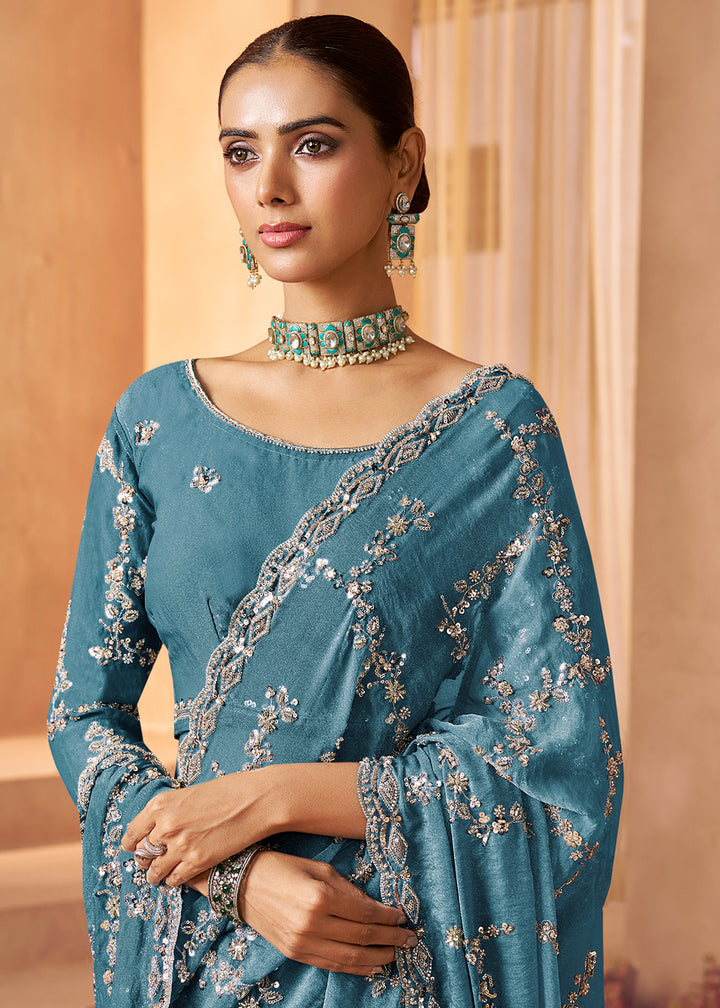 Buy Livid Blue Tissue Silk Heavy Embroidered Designer Saree Online in USA, UK, Canada, France, Germany, Italy, Denmark, UAE, Singapore & Worldwide at Empress.