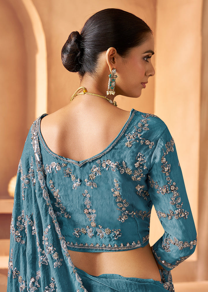 Buy Livid Blue Tissue Silk Heavy Embroidered Designer Saree Online in USA, UK, Canada, France, Germany, Italy, Denmark, UAE, Singapore & Worldwide at Empress.