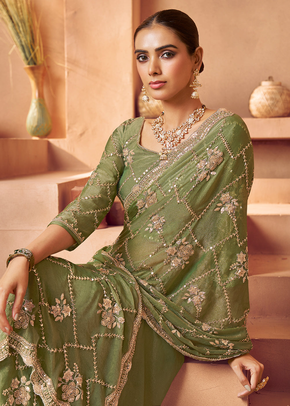 Buy Light Green Tissue Silk Heavy Embroidered Designer Saree Online in USA, UK, Canada, France, Germany, Italy, Denmark, UAE, Singapore & Worldwide at Empress.