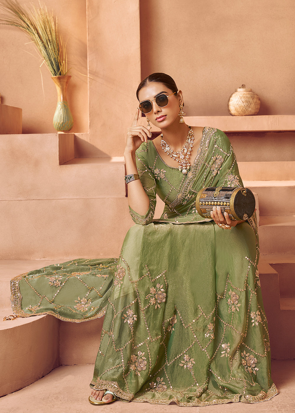 Buy Light Green Tissue Silk Heavy Embroidered Designer Saree Online in USA, UK, Canada, France, Germany, Italy, Denmark, UAE, Singapore & Worldwide at Empress.