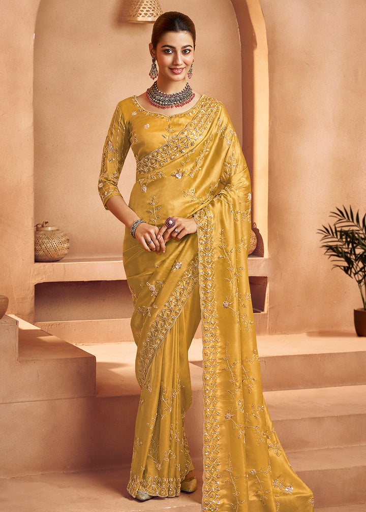 Buy Mustard Yellow Tissue Silk Heavy Embroidered Designer Saree Online in USA, UK, Canada, France, Germany, Italy, Denmark, UAE, Singapore & Worldwide at Empress.