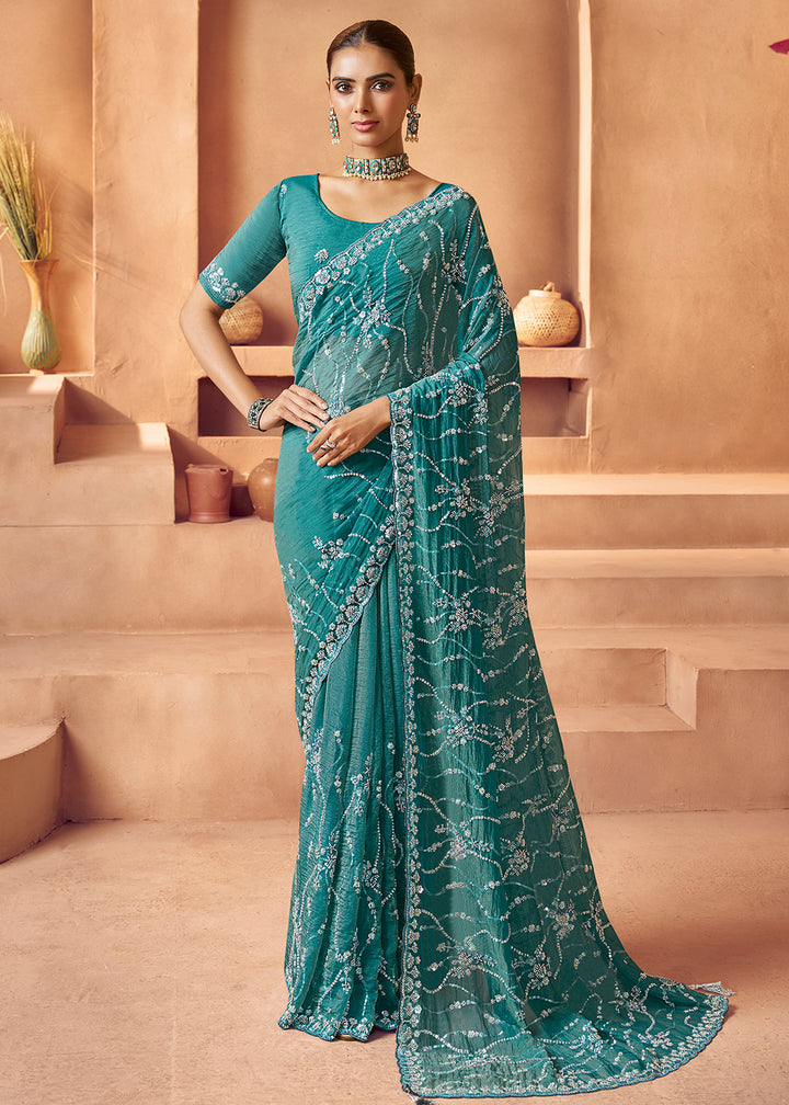 Buy Teal Blue Tissue Silk Heavy Embroidered Designer Saree Online in USA, UK, Canada, France, Germany, Italy, Denmark, UAE, Singapore & Worldwide at Empress.