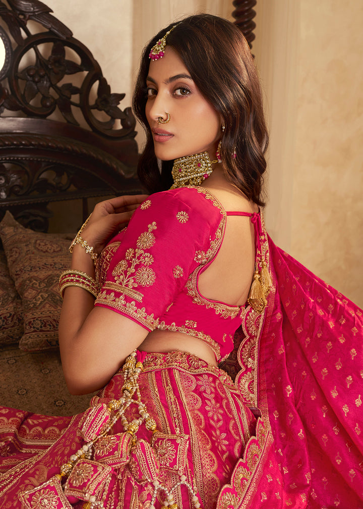 Buy Now Pink Banarasi Premium Silk Designer Lehenga Choli Online in US, UK, France, Swiss, Netherlands, Germany, Italy, Qatar, Canada & Worldwide at Empress.