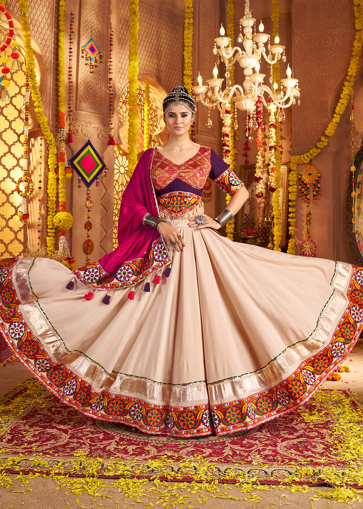 Buy Now Beige Viscose Rayon Embroidered Navratri Chaniya Choli Online in US, UK, Canada, France, Germany, Italy, Singapore, UAE & Worldwide at Empress Clothing.