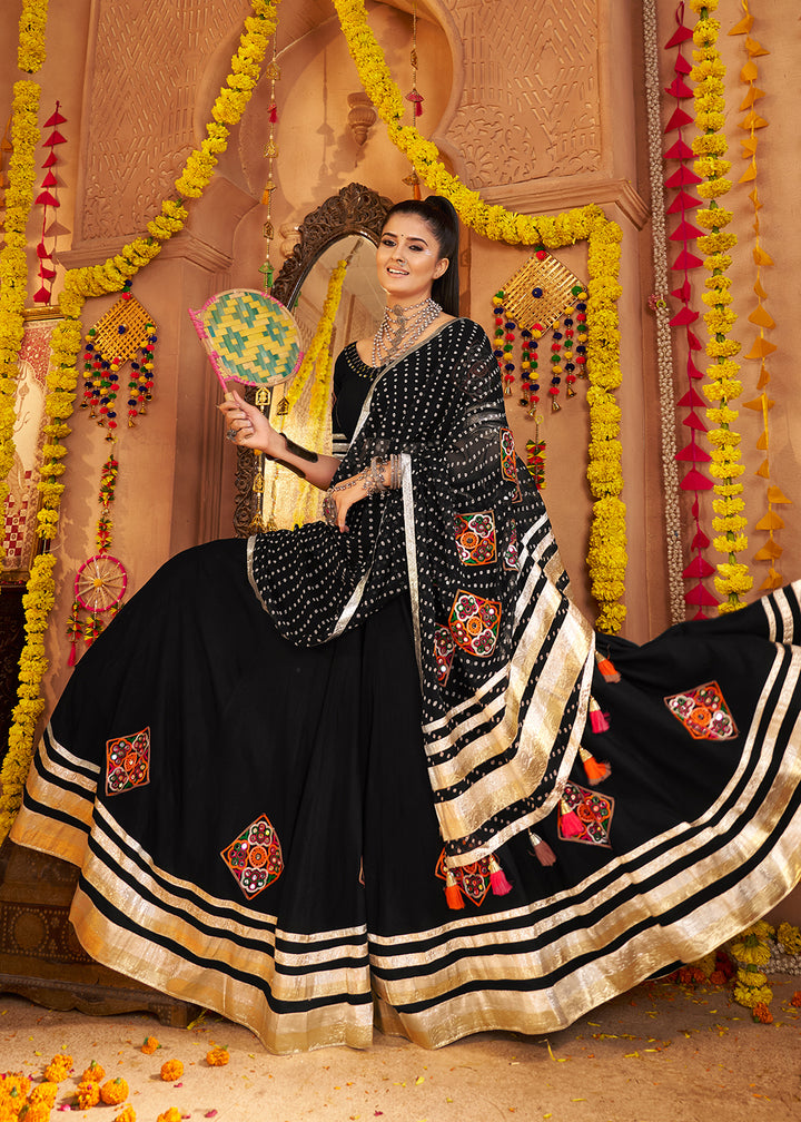 Buy Now Black Viscose Rayon Embroidered Navratri Chaniya Choli Online in US, UK, Canada, France, Germany, Italy, Austria, UAE & Worldwide at Empress Clothing.