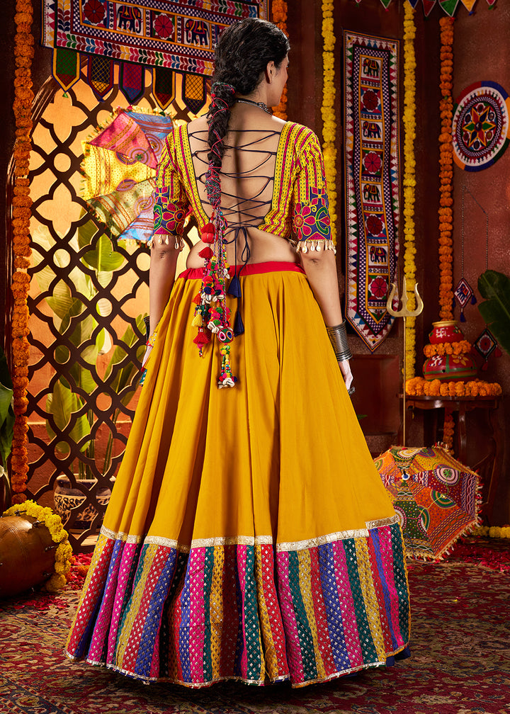 Buy Now Multi Red & Yellow Navratri Special Chaniya Choli Online in US, UK, Canada, France, Germany, Italy, Singapore, UAE & Worldwide at Empress Clothing.