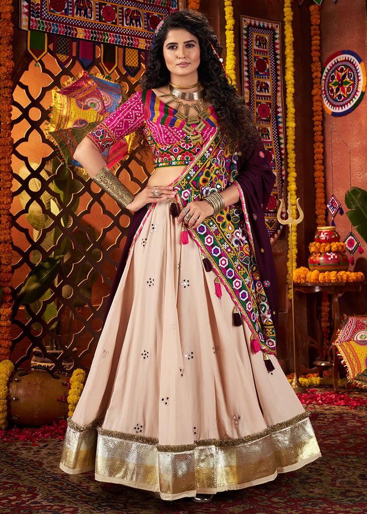 Buy Beige & Pink Viscose Cotton Mirror Chaniya Choli for Navratri Online in US, UK, Canada, France, Germany, Italy, Singapore, UAE & Worldwide at Empress.