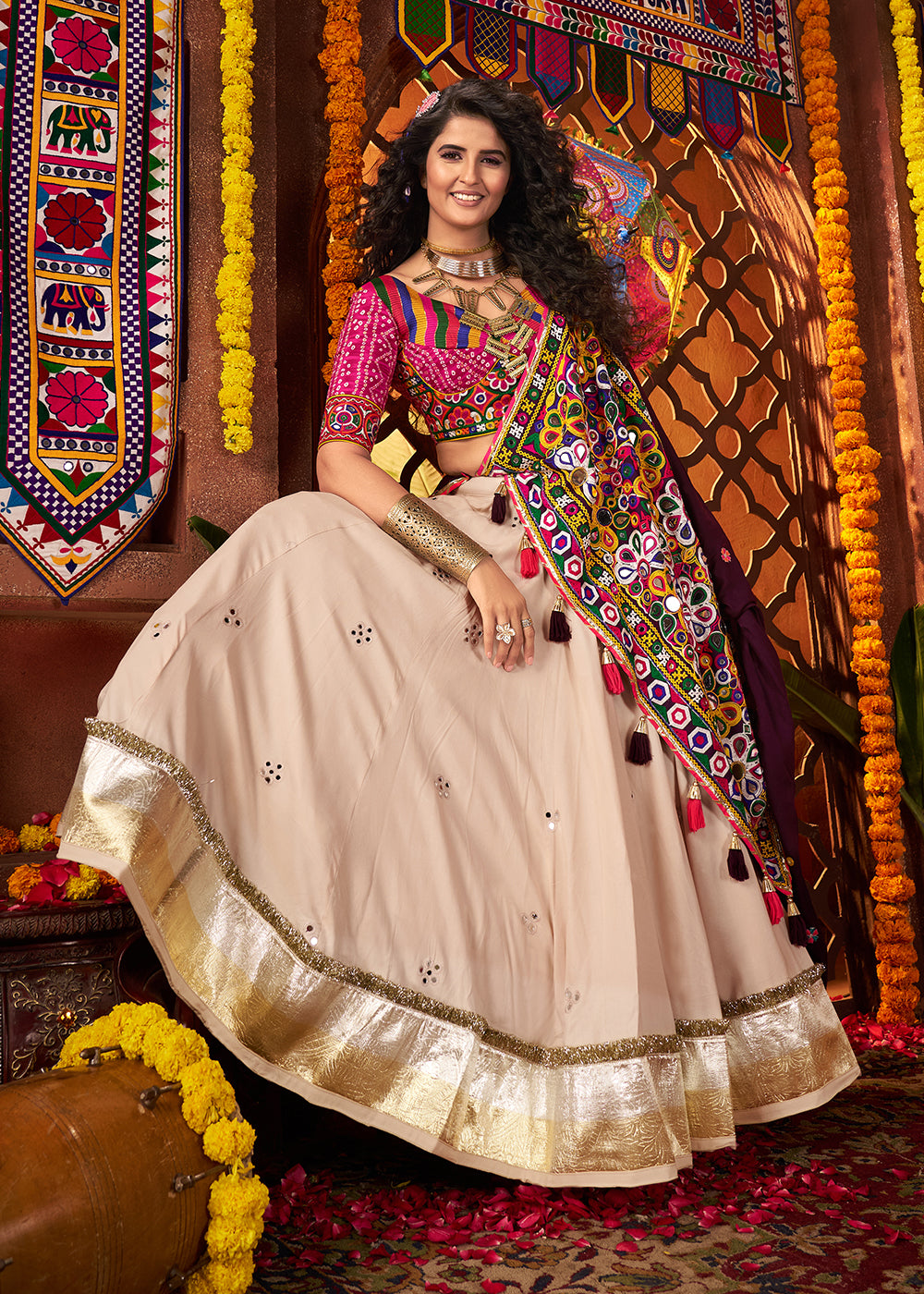 Buy Beige & Pink Viscose Cotton Mirror Chaniya Choli for Navratri Online in US, UK, Canada, France, Germany, Italy, Singapore, UAE & Worldwide at Empress.