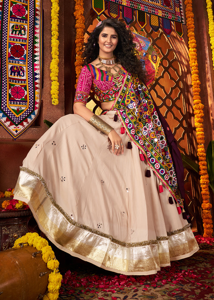 Buy Beige & Pink Viscose Cotton Mirror Chaniya Choli for Navratri Online in US, UK, Canada, France, Germany, Italy, Singapore, UAE & Worldwide at Empress.