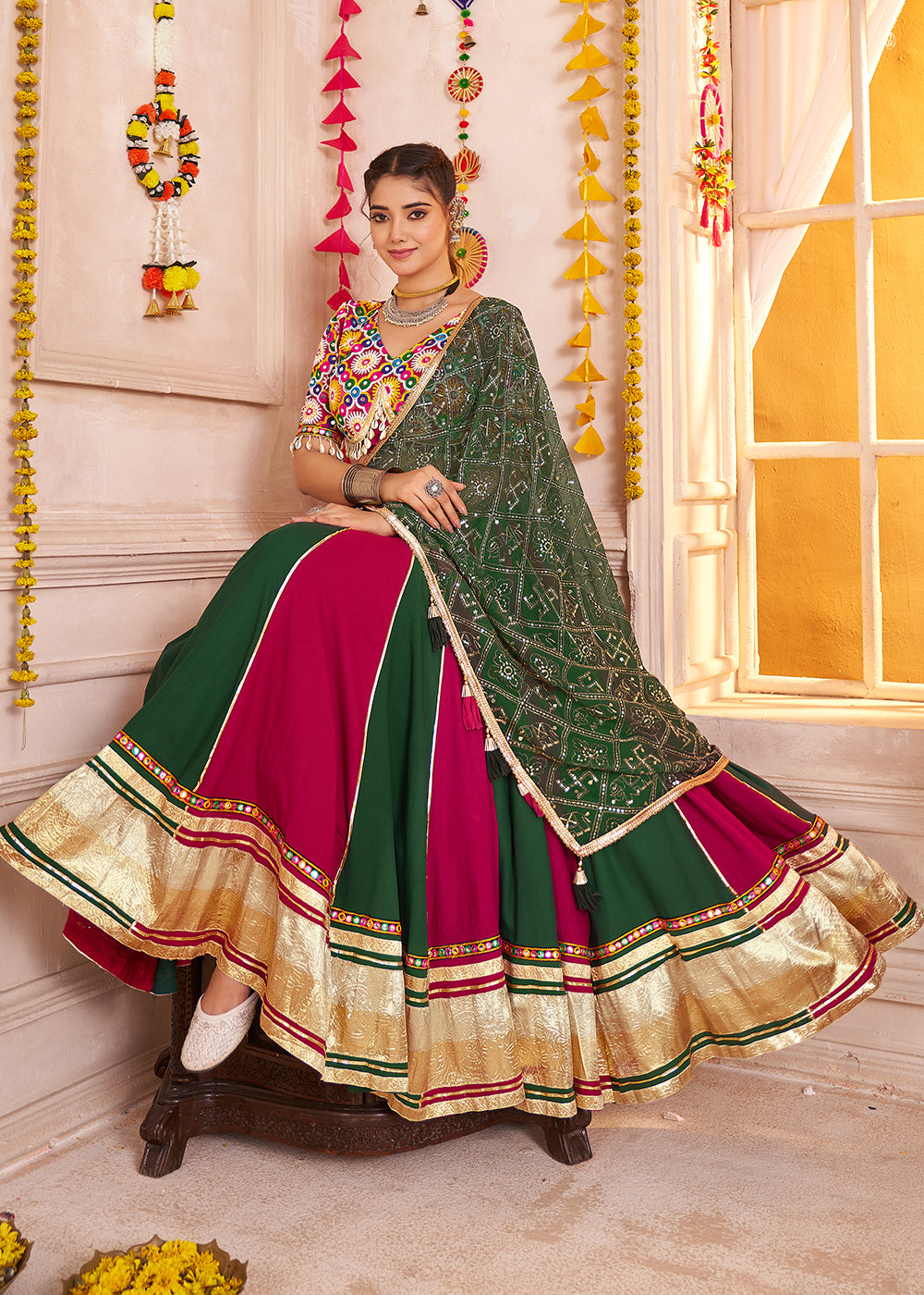 Buy Cotton Chaniya Choli in Green & Red for Navratri Online in US, UK, Canada, France, Germany, Italy, Singapore, Austria, UAE, Denmark & Worldwide at Empress.