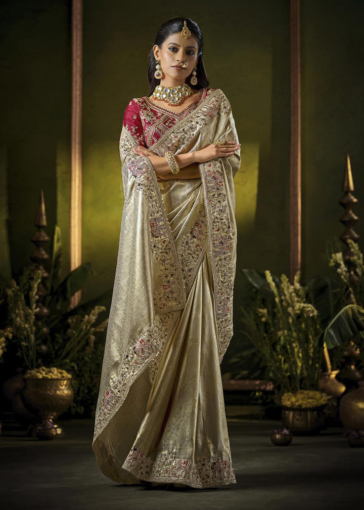 Buy Cream & Pink Heavy Silk Embroidered Bridal Wear Saree Online in USA, UK, Canada, France, Germany, Italy, Austria, Denmark, Singapore & Worldwide at Empress.