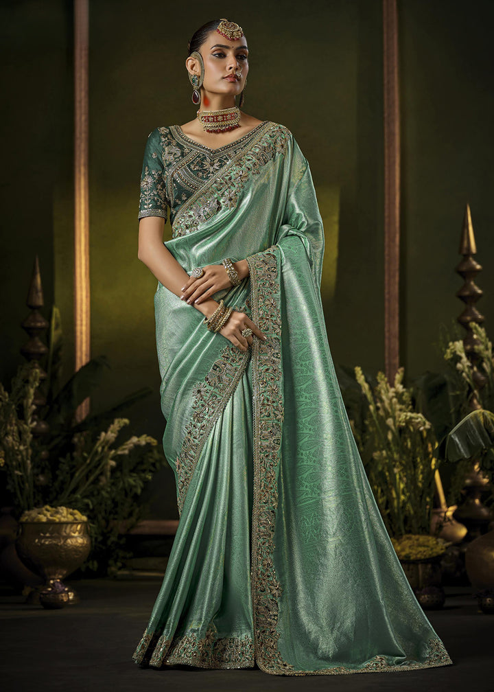 Buy Mint & Green Heavy Silk Embroidered Bridal Wear Saree Online in USA, UK, Canada, France, Germany, Italy, Austria, Denmark, Singapore & Worldwide at Empress.