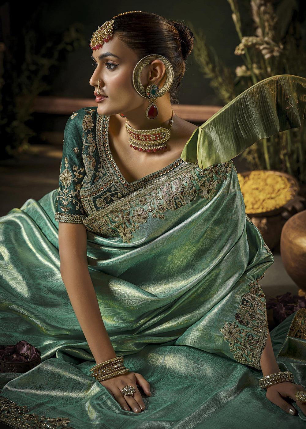 Buy Mint & Green Heavy Silk Embroidered Bridal Wear Saree Online in USA, UK, Canada, France, Germany, Italy, Austria, Denmark, Singapore & Worldwide at Empress.