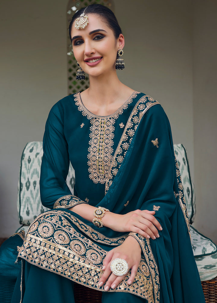 Buy Now Teal Blue Stone Work Embroidered Festive Palazzo Suit Online in USA, UK, UAE, Germany, Italy & Worldwide at Empress Clothing.