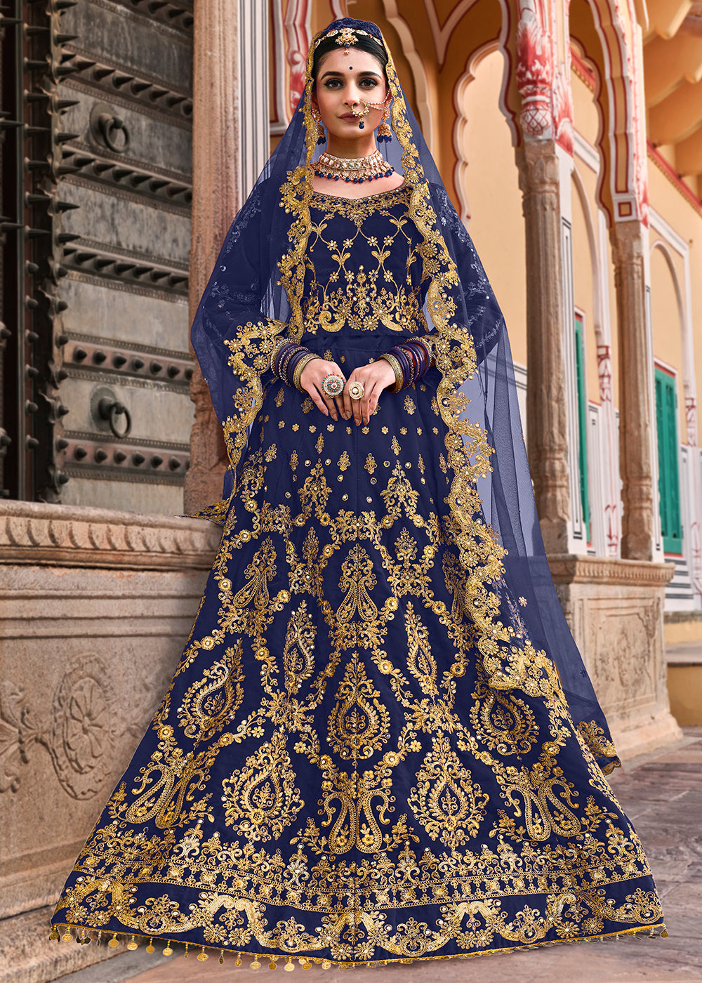 Buy Now Blue Velvet Heavy Embroidered A Line Lehenga Choli Online in USA, UK, Canada, France & Worldwide at Empress Clothing.