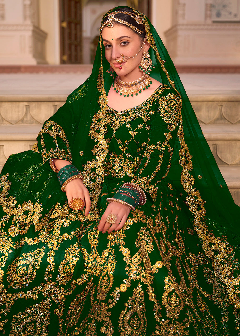 Buy Now Green Velvet Heavy Embroidered A Line Lehenga Choli Online in USA, UK, Canada, France & Worldwide at Empress Clothing.