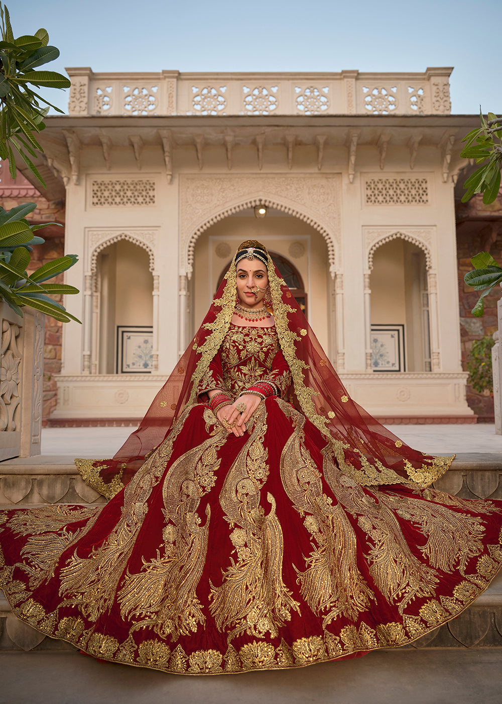 Buy Now Maroon & Gold Embroidered Velvet Wedding Lehenga Choli Online in USA, UK, France, UAE & Worldwide at Empress Clothing.