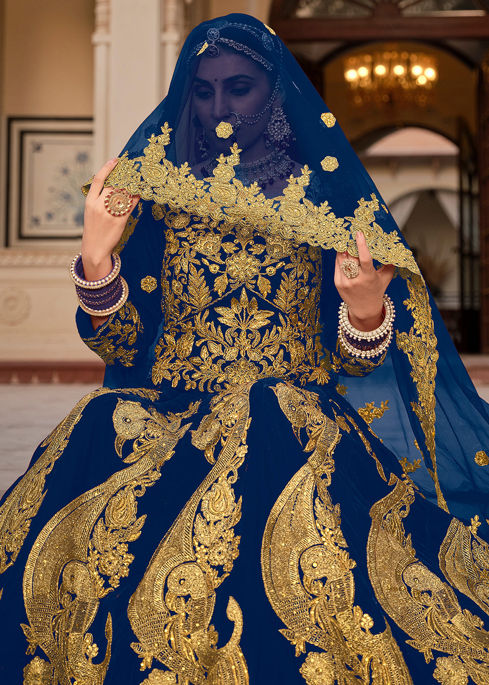 Buy Now Blue & Gold Embroidered Velvet Wedding Lehenga Choli Online in USA, UK, France, UAE & Worldwide at Empress Clothing