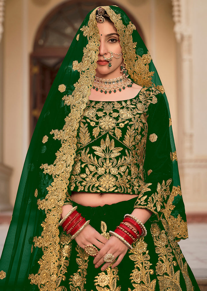 Buy Now Green & Gold Embroidered Velvet Wedding Lehenga Choli Online in USA, UK, France, UAE & Worldwide at Empress Clothing.