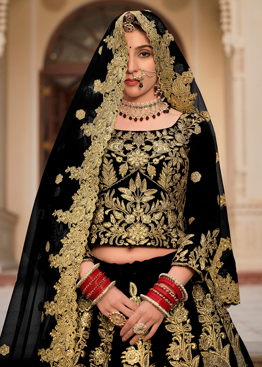 Buy Now Black & Gold Embroidered Velvet Wedding Lehenga Choli Online in USA, UK, France, UAE & Worldwide at Empress Clothing. 