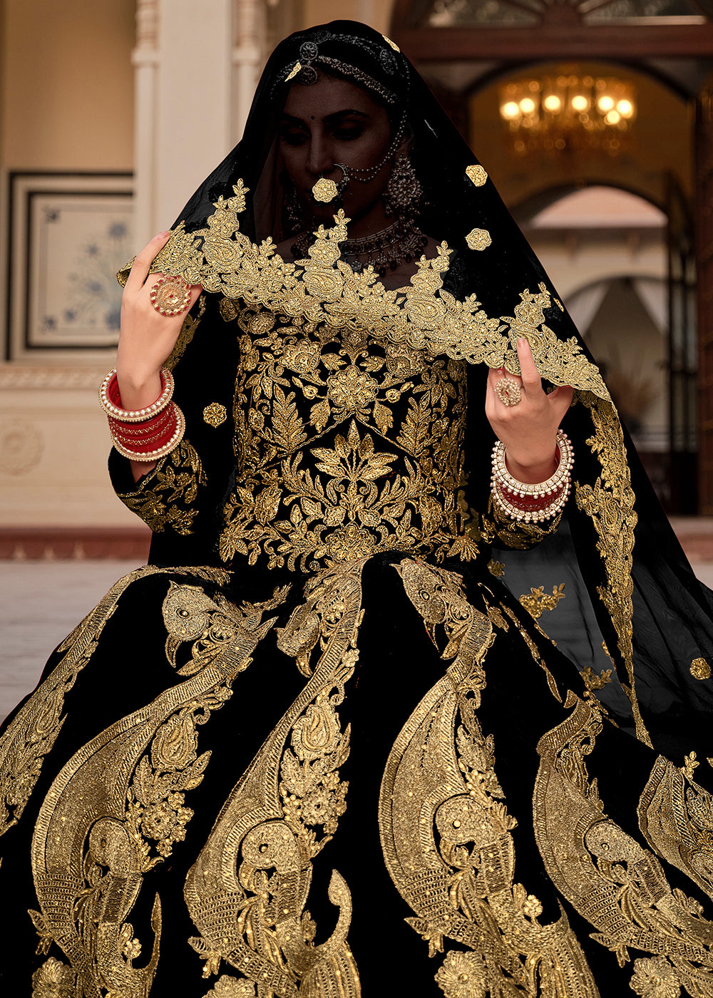 Buy Now Black & Gold Embroidered Velvet Wedding Lehenga Choli Online in USA, UK, France, UAE & Worldwide at Empress Clothing. 