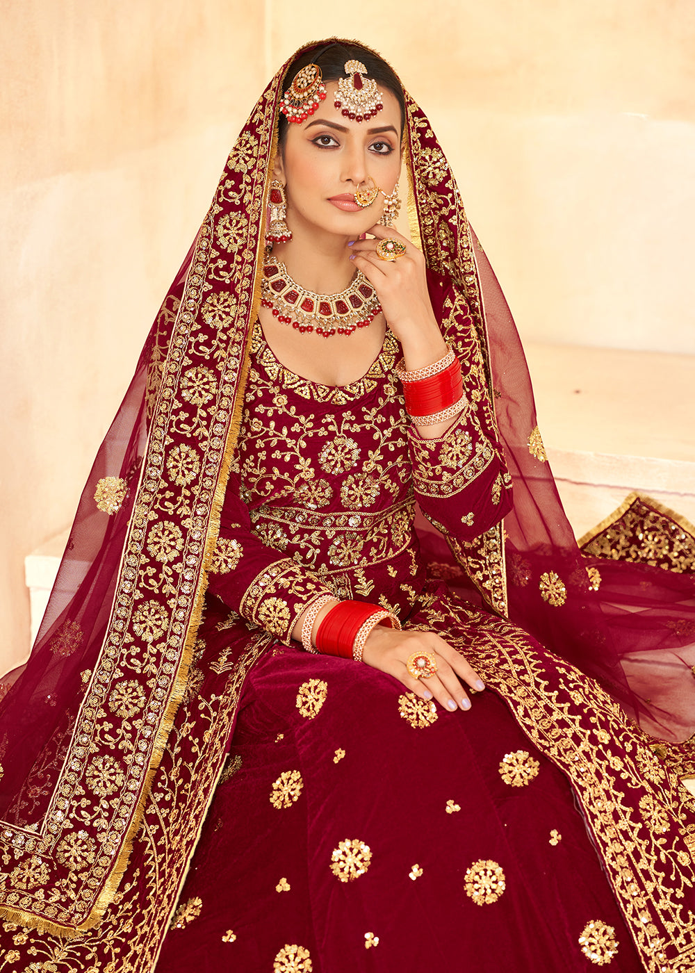 Buy Now Tempting Maroon Anarkali Style Velvet Wedding Lehenga Choli Online in USA, UK, Canada, France, Italy, Germany, UAE & Worldwide at Empress Clothing.