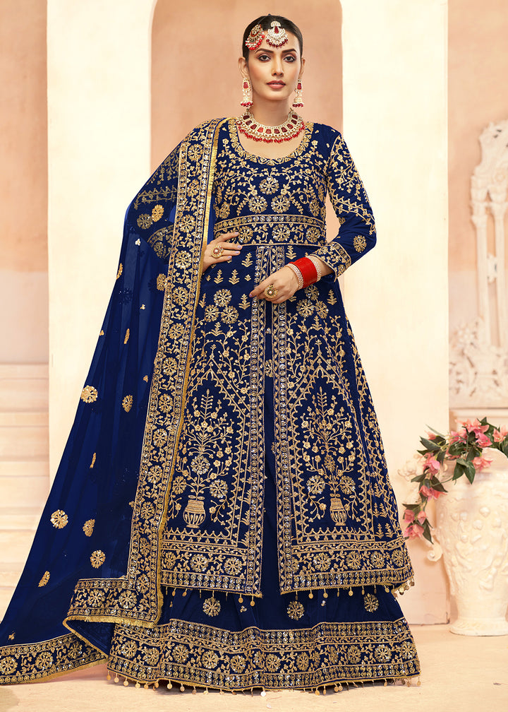 Buy Now Tempting Blue Anarkali Style Velvet Wedding Lehenga Choli Online in USA, UK, Canada, France, Italy, Germany, UAE & Worldwide at Empress Clothing.