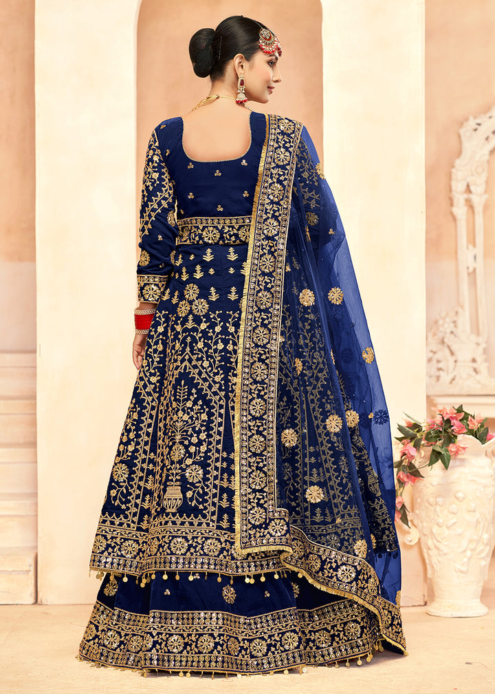 Buy Now Tempting Blue Anarkali Style Velvet Wedding Lehenga Choli Online in USA, UK, Canada, France, Italy, Germany, UAE & Worldwide at Empress Clothing.