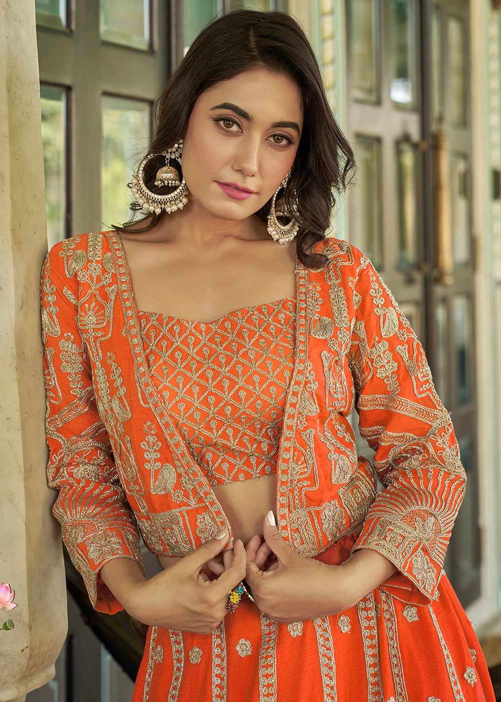 Buy Now Orange Chinnon Heavy Embroidered Koti Style Lehenga Choli Online in USA, UK, Canada, France, Italy, Germany, Australia & Worldwide at Empress Clothing.