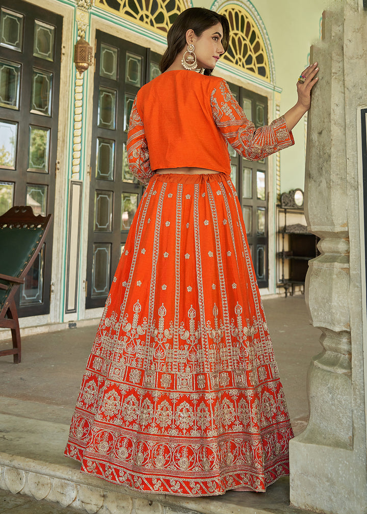 Buy Now Orange Chinnon Heavy Embroidered Koti Style Lehenga Choli Online in USA, UK, Canada, France, Italy, Germany, Australia & Worldwide at Empress Clothing.