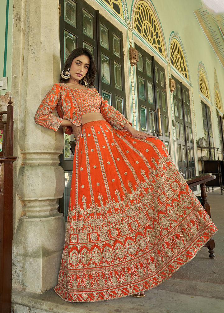 Buy Now Orange Chinnon Heavy Embroidered Koti Style Lehenga Choli Online in USA, UK, Canada, France, Italy, Germany, Australia & Worldwide at Empress Clothing.