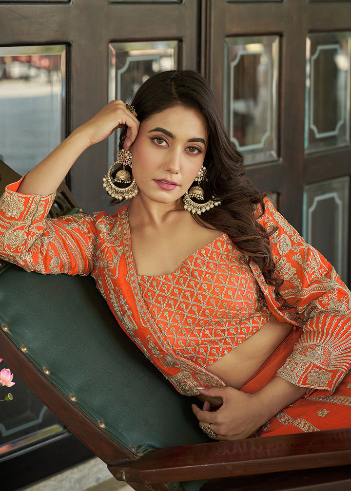 Buy Now Orange Chinnon Heavy Embroidered Koti Style Lehenga Choli Online in USA, UK, Canada, France, Italy, Germany, Australia & Worldwide at Empress Clothing.