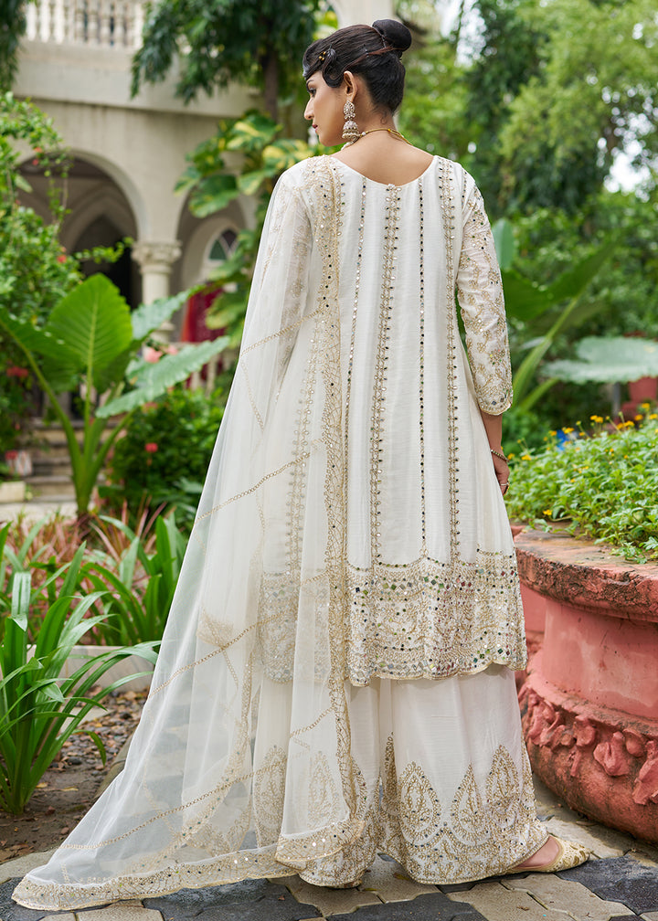 Buy Now White Chinnon Mirror Embroidered Palazzo Style Suit Online in New York, Toronto, Newark, Katy, Houston, Fremont, Dubai, Nevada & Worldwide at Empress.