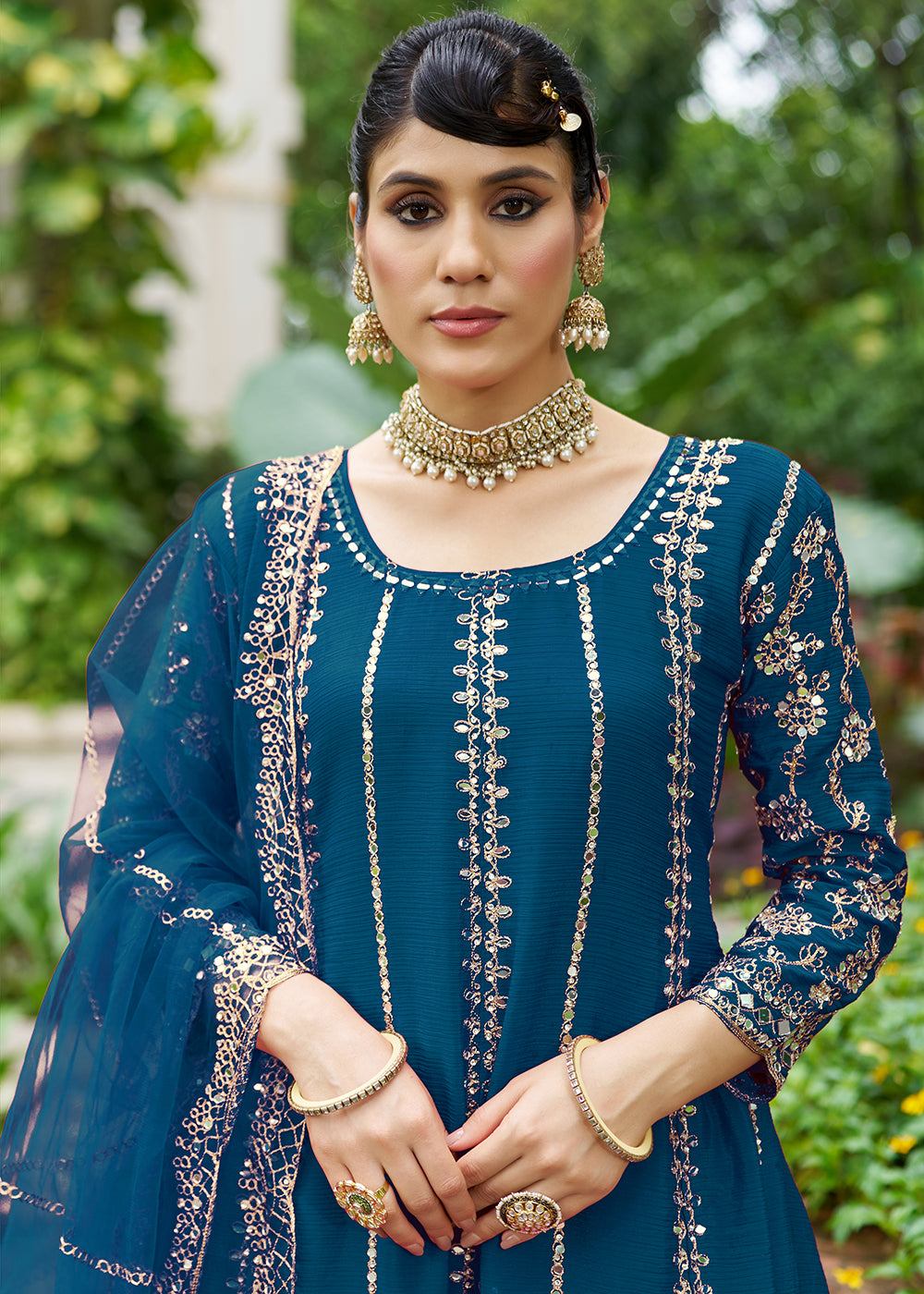 Buy Now Teal Chinnon Mirror Embroidered Palazzo Style Suit Online in New York, Toronto, Newark, Katy, Houston, Fremont, Dubai, Nevada & Worldwide at Empress.
